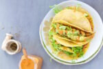 Tacos con salsa de enchilada.P&V