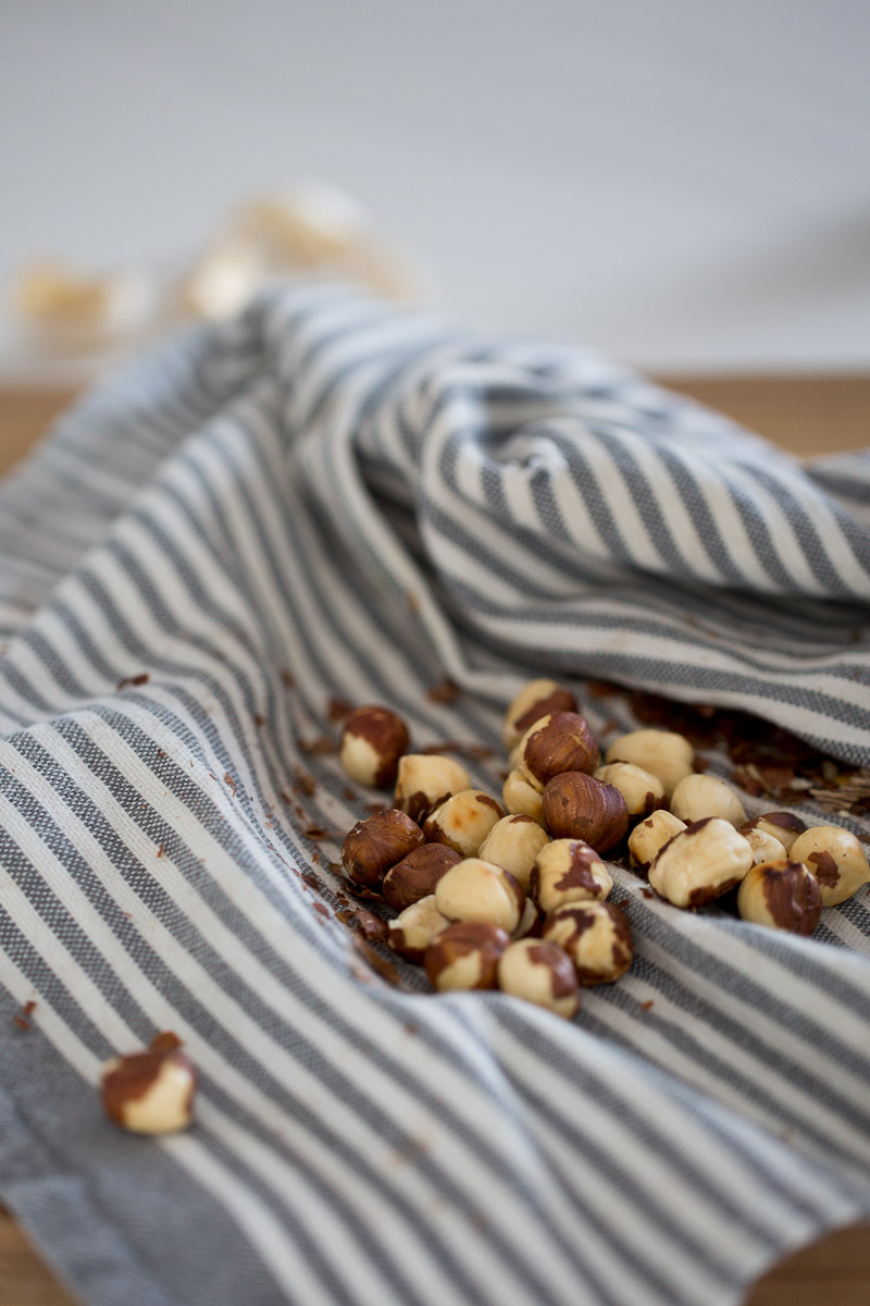 Nuts on a cutting board. (Keywords: simple vinaigrette)